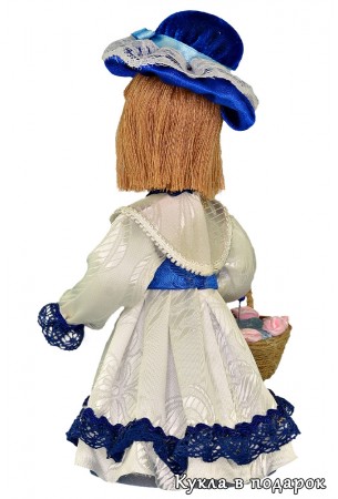 Кукла в белом с синим платье